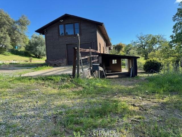 33 Myrtle Dr, Oroville, CA 95966 - rear view of house featuring an outdoor structure