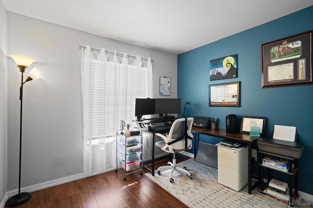 office area with hardwood / wood-style floors