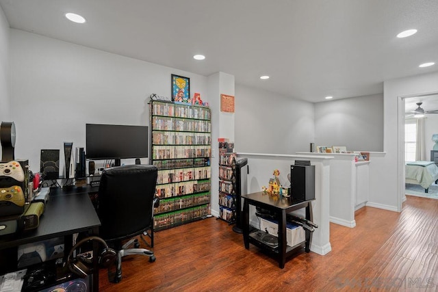 office space featuring ceiling fan and hardwood / wood-style flooring