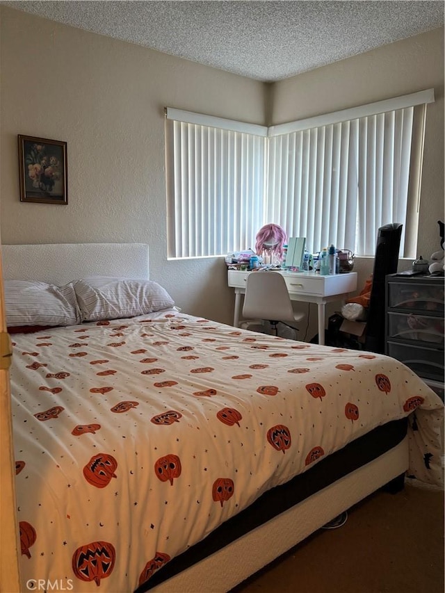 bedroom with a textured ceiling