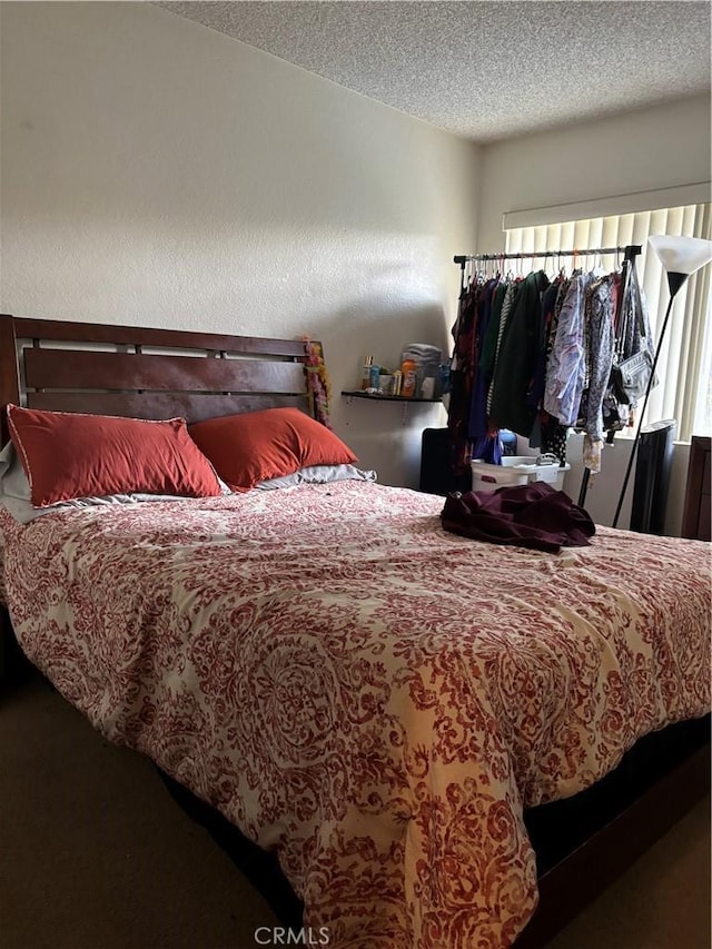 bedroom with a textured ceiling