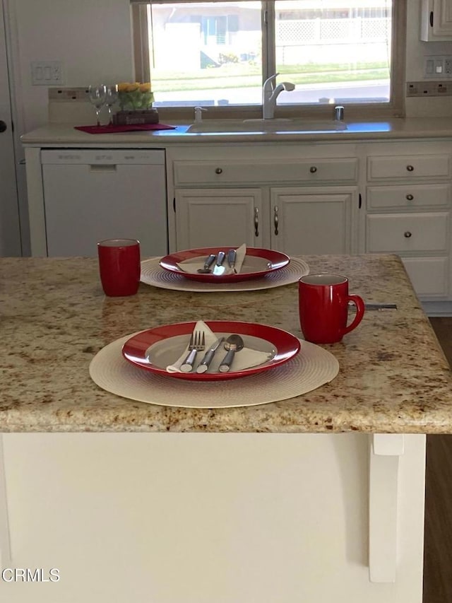 dining space featuring sink