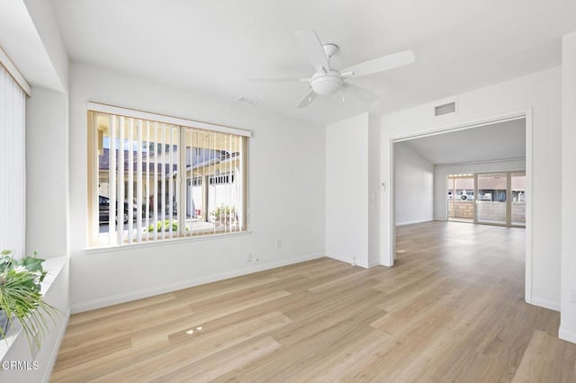 spare room with ceiling fan and light hardwood / wood-style flooring