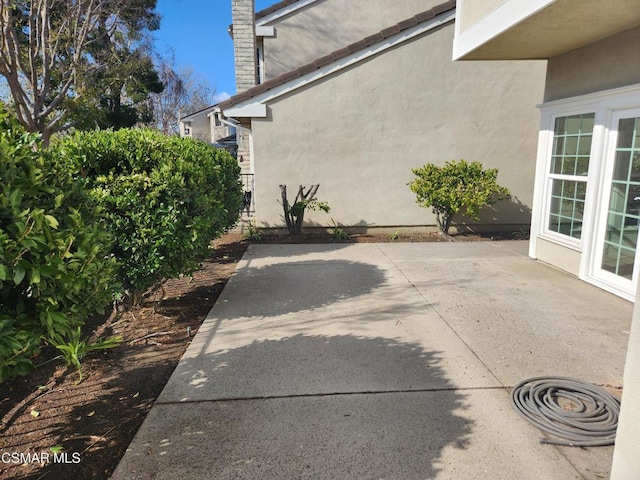 view of home's exterior with a patio area