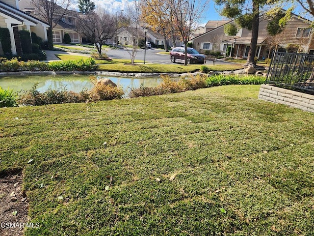 view of yard with a water view