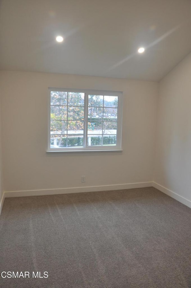 view of carpeted spare room