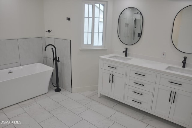 bathroom featuring a bathing tub and vanity