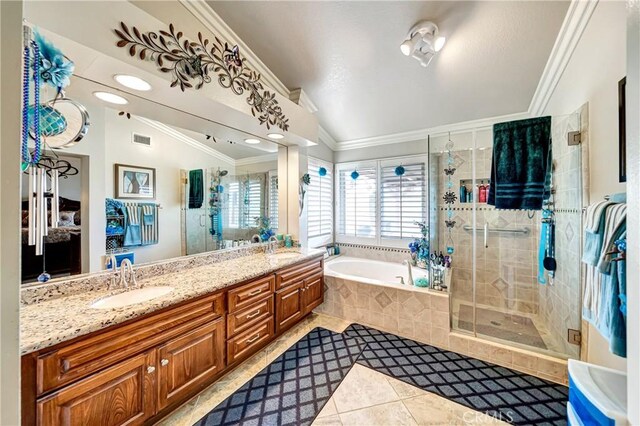 bathroom featuring separate shower and tub, tile patterned flooring, vaulted ceiling, crown molding, and vanity