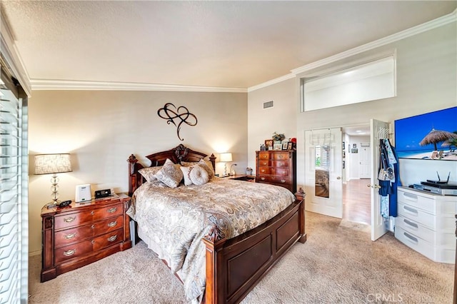 bedroom featuring ornamental molding and light carpet