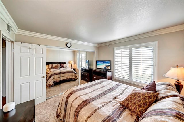 carpeted bedroom featuring a closet, ornamental molding, and multiple windows