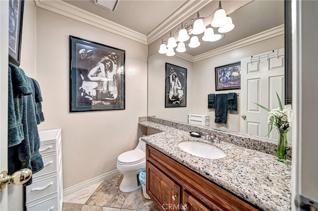 bathroom featuring toilet, vanity, and ornamental molding