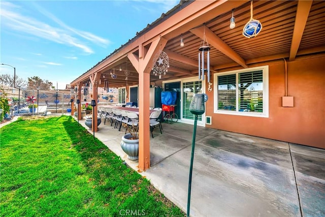 view of patio / terrace featuring exterior bar