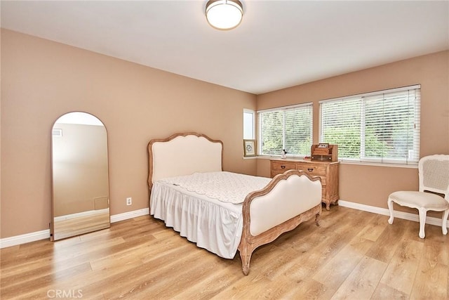 bedroom featuring light hardwood / wood-style floors