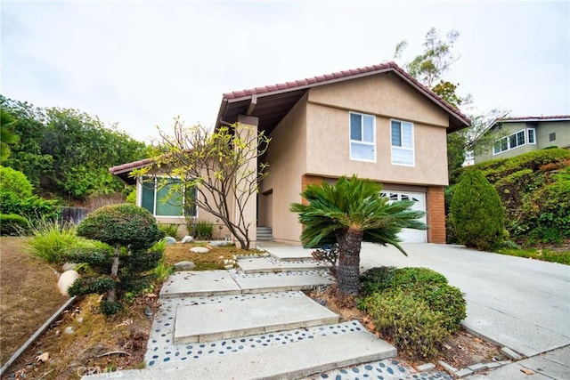 view of front of property with a garage