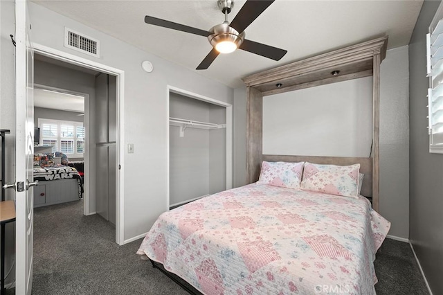 carpeted bedroom with ceiling fan and a closet