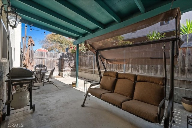 view of patio with an outdoor living space and area for grilling