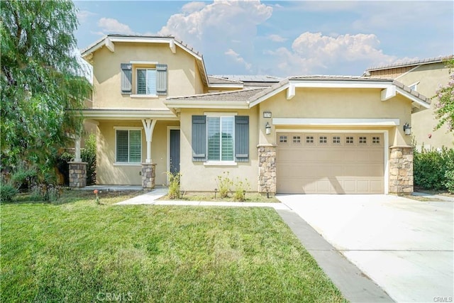 view of front of house featuring a garage, a front yard, and solar panels