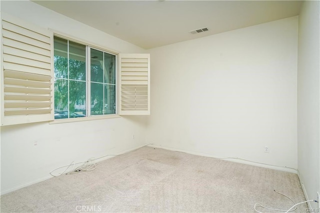 spare room with carpet floors