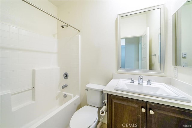 full bathroom featuring shower / bath combination, toilet, and vanity