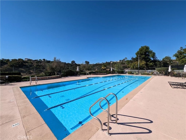 community pool with fence