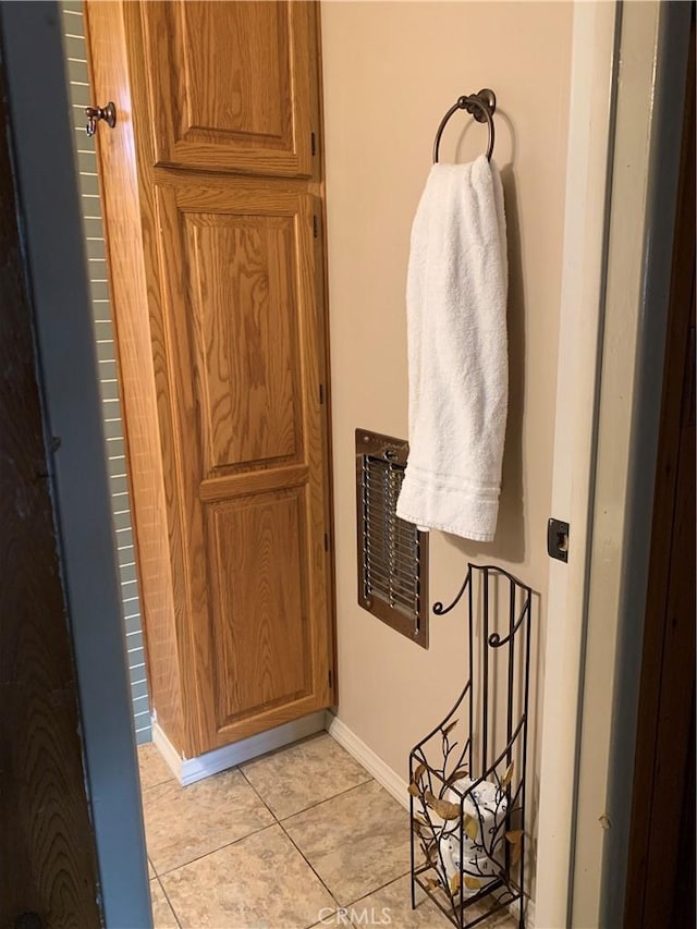 bathroom with tile patterned flooring