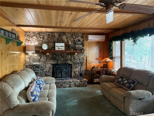 living room with ceiling fan, an AC wall unit, wood walls, a wood stove, and wooden ceiling