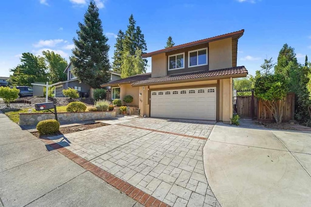 front facade with a garage