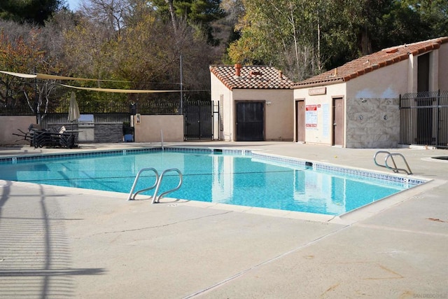 view of pool with a patio