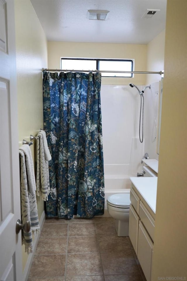 full bathroom featuring toilet, vanity, and shower / tub combo with curtain