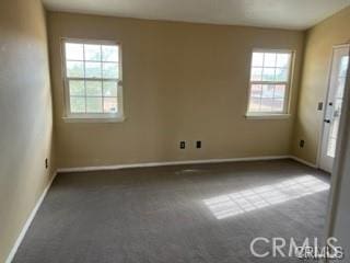 view of carpeted spare room