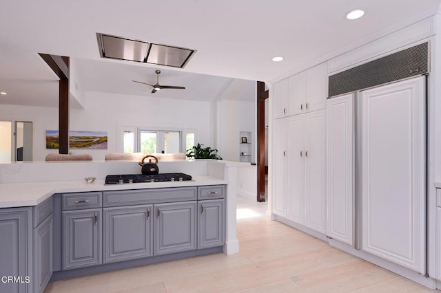 kitchen with ceiling fan, black gas cooktop, light hardwood / wood-style floors, gray cabinetry, and french doors