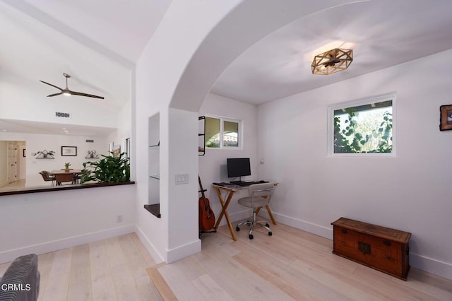 office with ceiling fan and light hardwood / wood-style floors