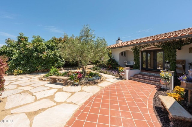 view of patio featuring french doors