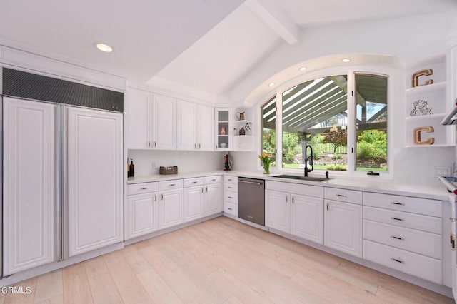 kitchen with dishwasher, white cabinetry, paneled built in fridge, vaulted ceiling with beams, and sink