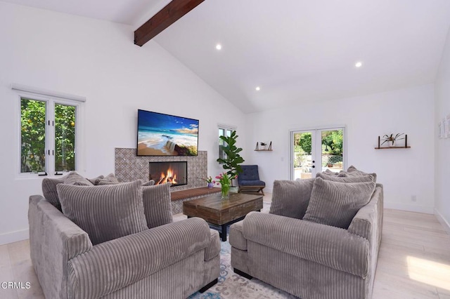 living room featuring beam ceiling, french doors, high vaulted ceiling, and light hardwood / wood-style flooring