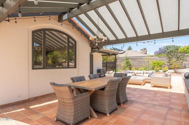 view of patio with an outdoor living space and a pergola