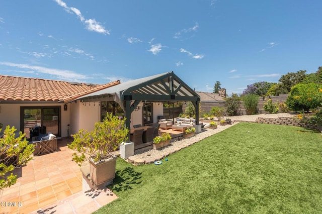 view of yard with a gazebo, an outdoor living space, and a patio