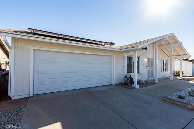 single story home with a garage