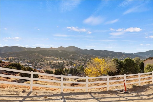 view of mountain feature with a rural view