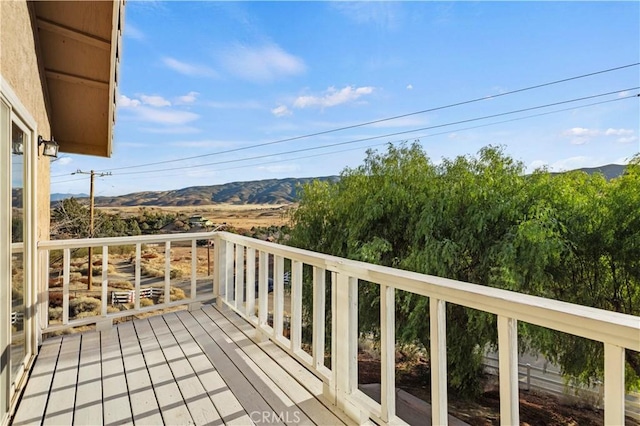 balcony featuring a mountain view