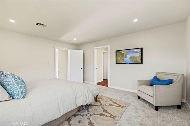 carpeted bedroom with recessed lighting, baseboards, and visible vents