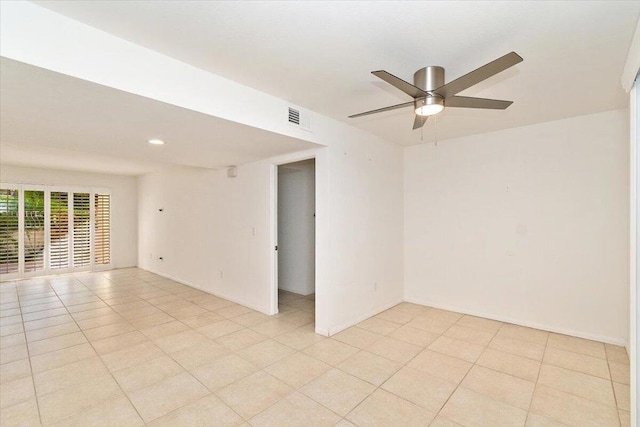 spare room with ceiling fan