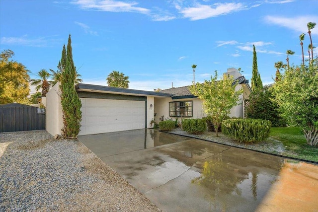 ranch-style home with a garage