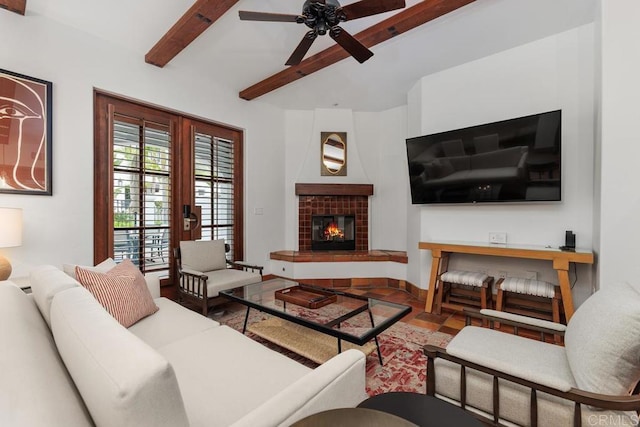 living room featuring a tiled fireplace, ceiling fan, french doors, and beamed ceiling