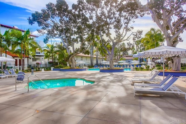 view of swimming pool featuring a patio