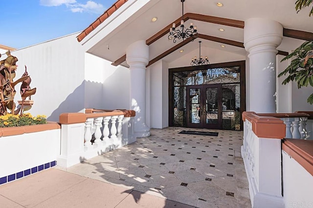 entrance to property featuring french doors