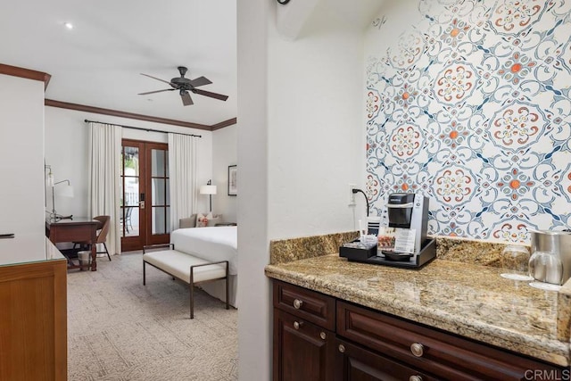 bathroom with crown molding, french doors, and ceiling fan