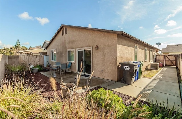 back of house featuring a patio area