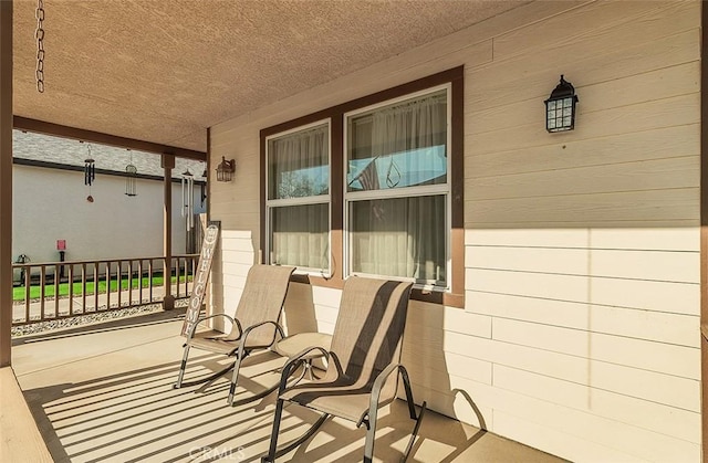 view of patio featuring covered porch