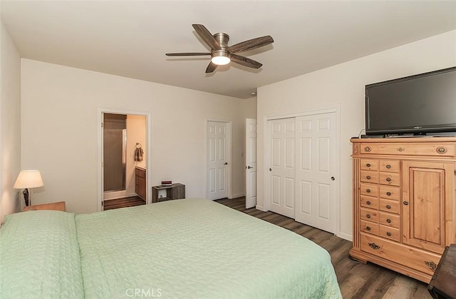 bedroom featuring ceiling fan, ensuite bathroom, dark hardwood / wood-style flooring, and a closet